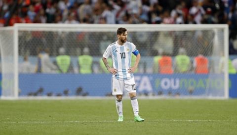 Argentina's Lionel Messi stands on the pitch at the end of the group D match between Argentina and Croatia at the 2018 soccer World Cup in Nizhny Novgorod Stadium in Nizhny Novgorod, Russia, Thursday, June 21, 2018. Croatia defeated Argentina 3-0. (AP Photo/Ricardo Mazalan)