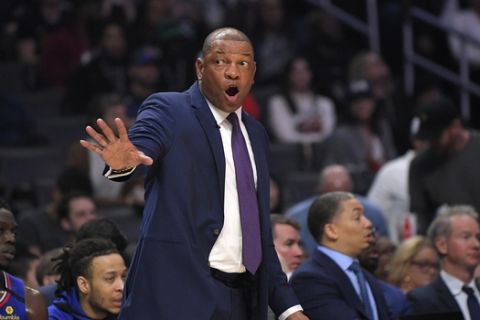 Los Angeles Clippers head coach Doc Rivers gestures during the first half of an NBA basketball game against the Philadelphia 76ers Sunday, March 1, 2020, in Los Angeles. (AP Photo/Mark J. Terrill)