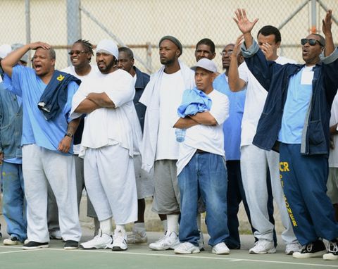 Inmates react to a play during a basketball game between staff members from the Golden State Warriors and the San Quentin Warriors basketball team at the California State Prison, San Quentin, in San Quentin, Calif., on Friday, Sept. 20, 2013. The Golden State Warriors, led by head coach Mark Jackson along with Prison Sports Ministries, played ball, had some laughs and talked of hope for the future to inmates. (Dan Honda/Bay Area News Group)