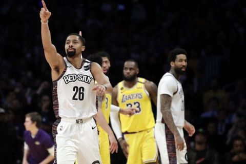 Brooklyn Nets' Spencer Dinwiddie (26) lobbies for a call to go in his team's favor during the second half of an NBA basketball game against the Los Angeles Lakers Tuesday, March 10, 2020, in Los Angeles. (AP Photo/Marcio Jose Sanchez)