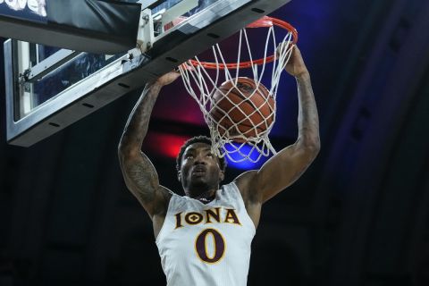 Iona's Berrick JeanLouis dunks against Marist during the second half of an NCAA college basketball game in the championship of the Metro Atlantic Athletic Conference Tournament, Saturday, March 11, 2023, in Atlantic City N.J. (AP Photo/Matt Rourke)