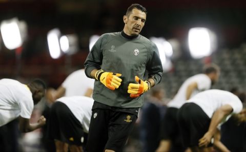 Juventus goalkeeper Gianluigi Buffon attends a training session at the Millennium Stadium in Cardiff, Wales Friday June 2, 2017. Real Madrid will play Juventus in the final of the Champions League soccer match in Cardiff on Saturday. (AP Photo/Kirsty Wigglesworth)