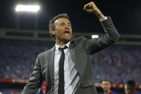 Barcelona's head coach Luis Enrique celebrates after the Copa del Rey final soccer match between Barcelona and Alaves at the Vicente Calderon stadium in Madrid, Spain, Saturday, May 27, 2017. Barcelona won the match 3-1. (AP Photo/Francisco Seco)