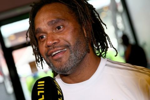 ALKMAAR, NETHERLANDS - SEPTEMBER 05:  Christian Karembeu of Real Madrid Legends gives interviews in the mixed area after the Laureus KickOffForGood Charity Match between Laureus All Stars against Real Madrid Legends at AFAS Stadiun Alkmaar on September 5, 2015 in Alkmaar, Netherlands.  (Photo by Christof Koepsel/Getty Images for Laureus)