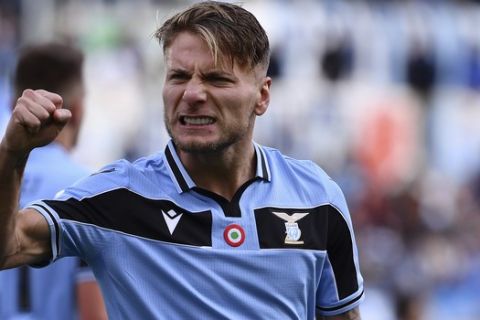 Lazio's Ciro Immobile celebrates after scoring his side's opening goal during the Serie A soccer match between Lazio and Spal, at the Rome Olympic Stadium Sunday, Feb. 2, 2020. (Alfredo Falcone/Lapresse via AP)