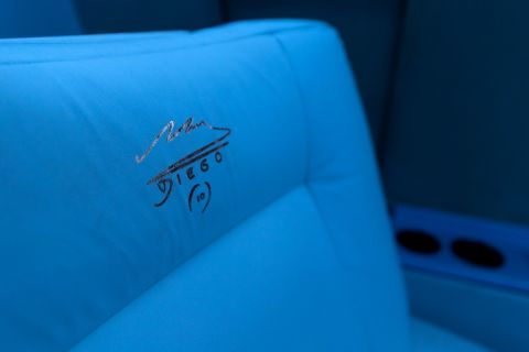 Detail of a seat inside an aircraft called Tango D10S painted with images depicting Argentine late football star Diego Armando Maradona, during its presentation in Moron, Buenos Aires province, Argentina, on May 25, 2022. - Some of the 1986 FIFA World Cup champions will travel to the Qatar FIFA World Cup on November, 2022 in the Tango D10S to pay homage to Maradona. (Photo by Tomas CUESTA / AFP)