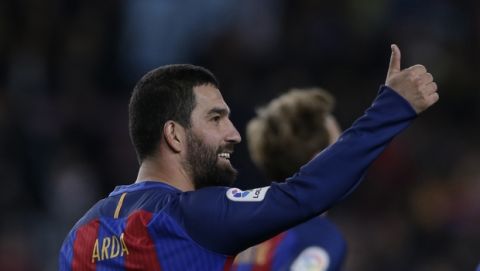 FC Barcelona's Arda Turan reacts after scoring a goal against Hercules during their Copa del Rey, Spain's King's Cup soccer match at the Camp Nou in Barcelona, Spain, Wednesday, Dec. 21, 2016. (AP Photo/Manu Fernandez)