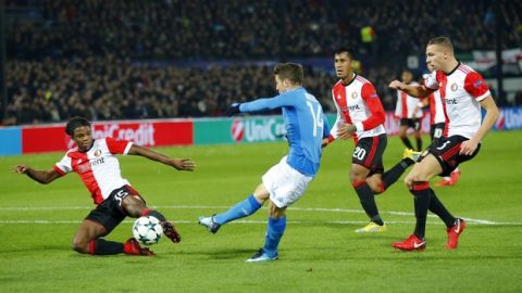 Napoli's Dries Mertens, center left, tries to score during a Champions League Group F soccer match between Feyenoord and Napoli at the Kuip stadium in Rotterdam, Netherlands, Wednesday, Dec. 6, 2017. (AP Photo/Peter Dejong)