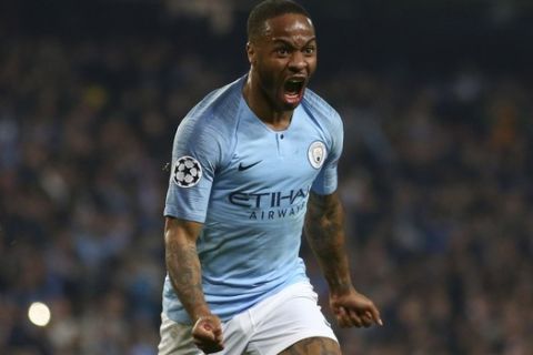 Manchester City's Raheem Sterling celebrates before his goal was disallowed for offside against Manchester City's Sergio Aguero following a VAR review during the Champions League quarterfinal, second leg, soccer match between Manchester City and Tottenham Hotspur at the Etihad Stadium in Manchester, England, Wednesday, April 17, 2019. (AP Photo/Dave Thompson)