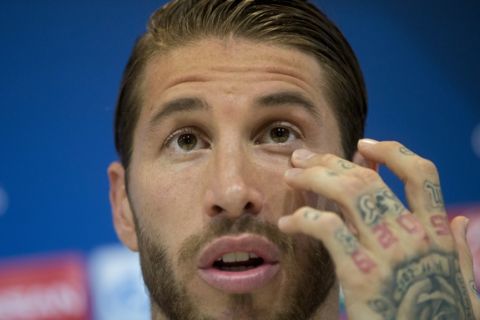 Real Madrid's Sergio Ramos speaks during a press conference in Madrid, Tuesday, May 9, 2017. Real Madrid will play against Atletico Madrid on Wednesday in a Champions League semifinal, 2nd leg soccer match. (AP Photo/Paul White)