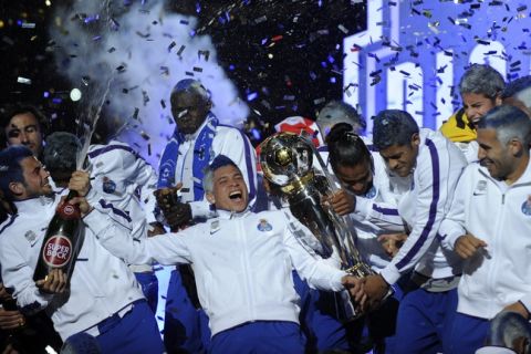 FC Porto´s players celebrate with the trophy for the 2011/2012 Portuguese League champions after their Portuguese football match against Sporting at Dragao Stadium in Porto on May 5, 2012. AFP PHOTO/ FRANCISCO LEONGFRANCISCO LEONG/AFP/GettyImages