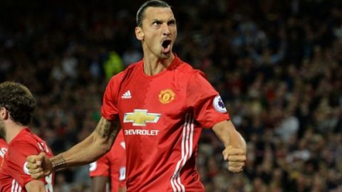 Manchester United's Swedish striker Zlatan Ibrahimovic celebrates after scoring their second goal from the penalty spot during the English Premier League football match between Manchester United and Southampton at Old Trafford in Manchester, north west England, on August 19, 2016. / AFP / Oli SCARFF / RESTRICTED TO EDITORIAL USE. No use with unauthorized audio, video, data, fixture lists, club/league logos or 'live' services. Online in-match use limited to 75 images, no video emulation. No use in betting, games or single club/league/player publications.  /         (Photo credit should read OLI SCARFF/AFP/Getty Images)