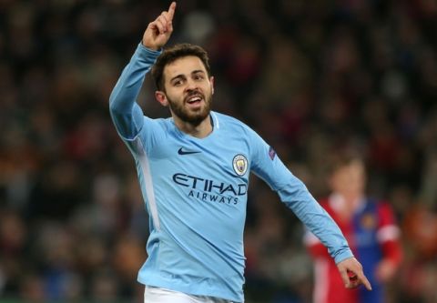 BASEL, SWITZERLAND - FEBRUARY 13: Bernardo Silva of Manchester City celebrates after scoring his sides second goal during the UEFA Champions League Round of 16 First Leg  match between FC Basel and Manchester City at St. Jakob-Park on February 13, 2018 in Basel, Switzerland.  (Photo by Victoria Haydn/Man City via Getty Images)