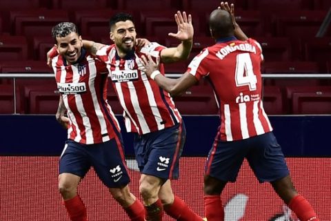 Οι παίκτες της Ατλέτικο Μαδρίτης πανηγυρίζουν γκολ του Λουίς Σουάρες κόντρα στην Θέλτα σε ματς της La Liga