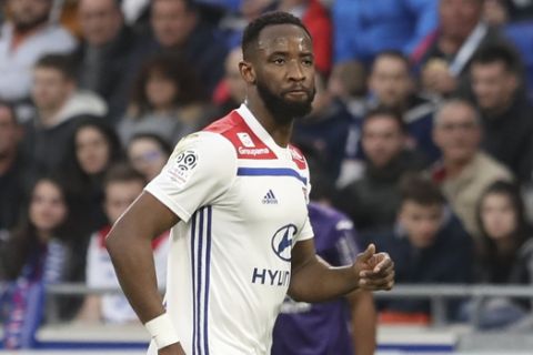 Lyon forward Moussa Dembele looks on during the French League One soccer match between Lyon and Toulouse, in Decines, near Lyon, central France, Sunday, March 3, 2019. (AP Photo/Laurent Cipriani)