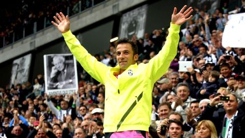 Juventus captain Alessandro Del Piero waves to supporters as he celebrates the victory of the Italian 'scudetto' 2011-2012 after a Serie A soccer match between Juventus and Atalanta at the Juventus Stadium in Turin, Italy, Sunday, May 13, 2012. (AP Photo/Massimo Pinca) 