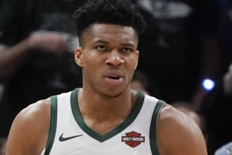 Milwaukee Bucks' Giannis Antetokounmpo reacts after being fouled during the second half of Game 2 of the NBA Eastern Conference basketball playoff finals against the Toronto Raptors Friday, May 17, 2019, in Milwaukee. The Bucks won 125-103 to take a 2-0 lead in the series. (AP Photo/Morry Gash)