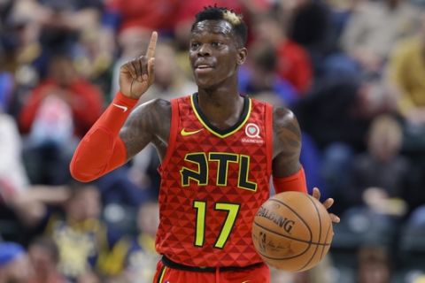 Atlanta Hawks guard Dennis Schroder (17) plays against the Indiana Pacers during the second half of an NBA basketball game in Indianapolis, Friday, Feb. 23, 2018. The Pacers defeated the Hawks 116-93. (AP Photo/Michael Conroy)