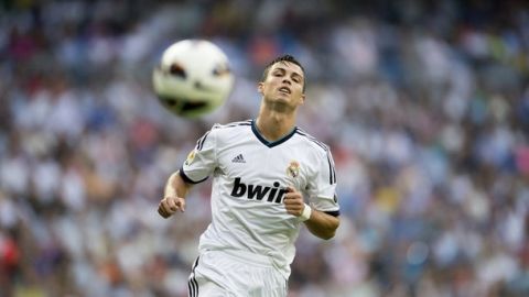 Real Madrid's Portuguese forward Cristiano Ronaldo gestures on August  19, 2012 during a Spanish league football match against Valencia at the Santiago Bernabeu stadium in Madrid.   AFP PHOTO/ DANI POZO        (Photo credit should read DANI POZO/AFP/GettyImages)