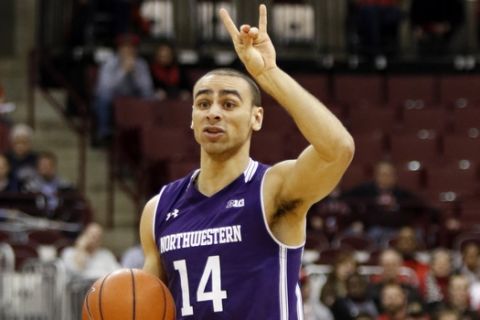 Northwestern's Tre Demps works against Ohio State during an NCAA college basketball game in Columbus, Ohio, Tuesday, Feb. 9, 2016. Ohio State won 71-63. (AP Photo/Paul Vernon)