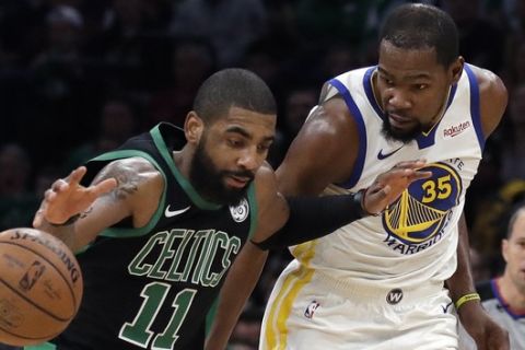 Boston Celtics guard Kyrie Irving (11) dribbles against Golden State Warriors forward Kevin Durant (35) in the first quarter of an NBA basketball game, Saturday, Jan. 26, 2019, in Boston. (AP Photo/Elise Amendola)