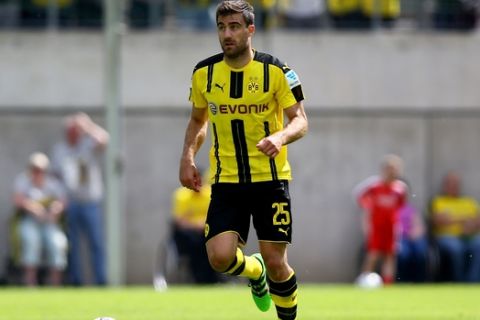 WUPPERTAL, GERMANY - JULY 09:  Sokratis of Dortmund runs with the ball during the friendly match between Wuppertaler SV and Borussia Dortmund at Stadion Zoo on July 9, 2016 in Wuppertal, Germany.  (Photo by Christof Koepsel/Bongarts/Getty Images)