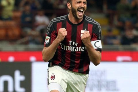Ac Milan forward Giampaolo Pazzini celebrates after scoring the 2-0 goal during the Italian serie A soccer match between AC Milan and Fc Torino  at Giuseppe Meazza stadium in Milan, 24 may  2015. 
ANSA / MATTEO BAZZI