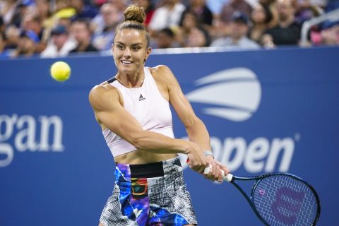 Maria Sakkari, of Greece, hits a return during a "The Tennis Plays for Peace" exhibition match to raise awareness and humanitarian aid for Ukraine Wednesday, Aug. 24, 2022, in New York. The 2022 U.S. Open Main Draw will begin on Monday, Aug. 29, 2022. (AP Photo/Frank Franklin II)