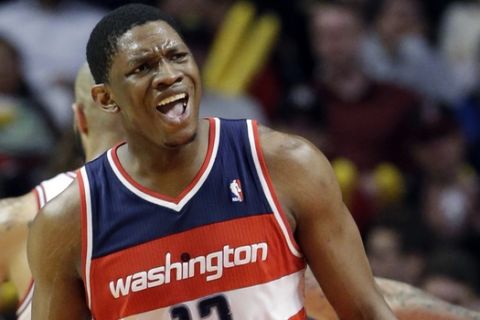 Washington Wizards center Kevin Seraphin reacts to a call during the second half of an NBA basketball game against the Chicago Bulls in Chicago, Wednesday, April 17, 2013. The Bulls won 95-92. (AP Photo/Nam Y. Huh)