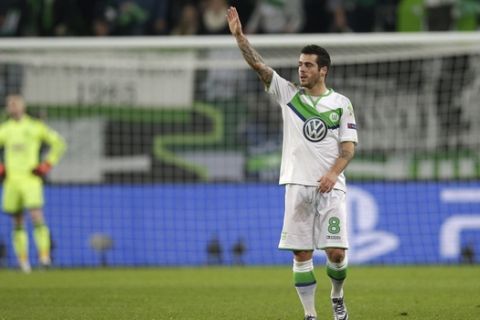 Wolfsburg's Vieirinha celebrates after scoring his side's second goal during the Champions League group B soccer match between VfL Wolfsburg and Manchester United in Wolfsburg, Germany, Tuesday, Dec. 8, 2015. (AP Photo/Michael Sohn)