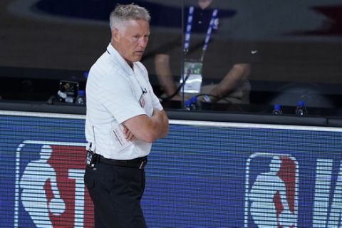 Philadelphia 76ers head coach Brett Brown stands on the sidelines during the second half of an NBA basketball game against the Houston Rockets, Friday, Aug. 14, 2020, in Lake Buena Vista, Fla. (AP Photo/Ashley Landis, Pool)