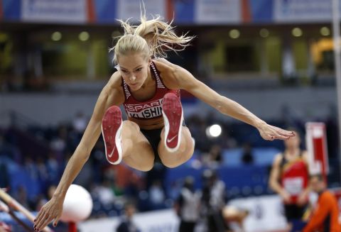 Darya Klishina makes an attempt in the women's long jump final during the European Athletics Indoor Championships in Belgrade, Serbia, Sunday, March 5, 2017. (AP Photo/Marko Drobnjakovic)
