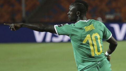 Senegal's Sadio Mane celebrates after scoring his side's opening goal during the African Cup of Nations round of 16 soccer match between Uganda and Senegal in Cairo International stadium in Cairo, Egypt, Friday, July 5, 2019. (AP Photo/Hassan Ammar)