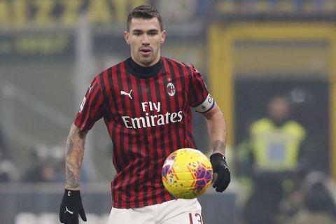 AC Milan's Alessio Romagnoli controls the ball during the Serie A soccer match between Inter Milan and AC Milan at the San Siro Stadium, in Milan, Italy, Sunday, Feb. 9, 2020. (AP Photo/Antonio Calanni)