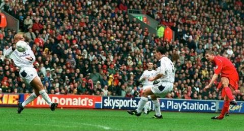 steven gerrard of liverpool scores with a long range shot against manchester united