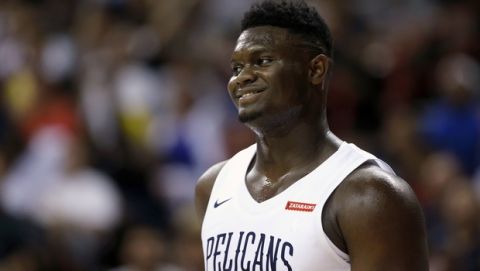 New Orleans Pelicans' Zion Williamson (1) smiles during the team's NBA summer league basketball game against the New York Knicks on Friday, July 5, 2019, in Las Vegas. (AP Photo/Steve Marcus)
