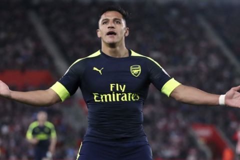 Arsenal's Alexis Sanchez celebrates scoring his side's first goal of the game during their English Premier League soccer match against Southampton at St Mary's, Southampton, England, Wednesday, May 10, 2017. (Nick Potts/PA via AP)