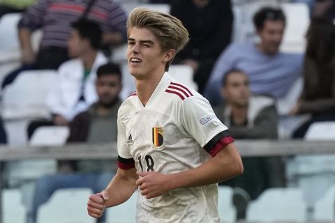 FILE - Belgium's Charles De Ketelaere, celebrates after scoring his side's opening goal during the UEFA Nations League third place soccer match between Italy and Belgium at the Juventus stadium, in Turin, Italy, Sunday, Oct. 10, 2021.  Club Brugge won the Belgian league title for the third season in a row, and the 18th time overall, qualifying for next seasons Champions League in the process with a 3-1 win at Royal Antwerp on Sunday, May 15, 2022. (AP Photo/Antonio Calanni, File)