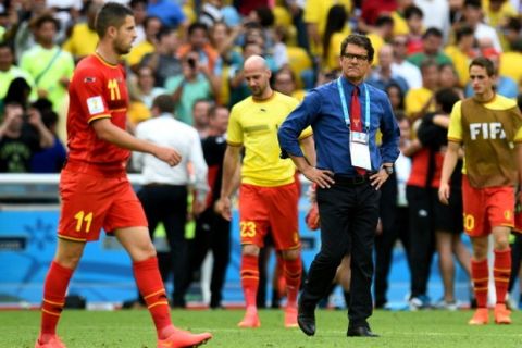 RIO DE JANEIRO, BRAZIL - JUNE 22: Head coach Fabio Capello (2nd R) of Russia reacts after the 0-1 defeat in the 2014 FIFA World Cup Brazil Group H match between Belgium and Russia at Maracana on June 22, 2014 in Rio de Janeiro, Brazil.  (Photo by Shaun Botterill - FIFA/FIFA via Getty Images)
