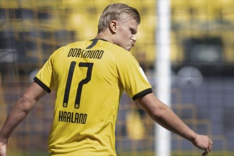 Dortmund's Erling Haaland reacts during the German Bundesliga soccer match between Borussia Dortmund and 1899 Hoffenheim in Dortmund, Germany, Saturday, June 27, 2020. (Bernd Thissen/DPA via AP, Pool)