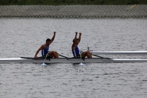 BREST, BELARUS - JULY 25: The BLM2x team from Greece Panagiotis Magdanis, Eleftherios Konsolas celebrate victory during the FISA World Rowing U23 Championships at The Brest Rowing Course on July 25, 2010 in Brest, Belarus. (Photo by Piotr Malecki/Getty Images)