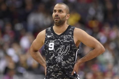 San Antonio Spurs guard Tony Parker (9) looks on during the second half of an NBA basketball game against the Washington Wizards, Tuesday, March 27, 2018, in Washington. The Wizards won 116-106. (AP Photo/Nick Wass)