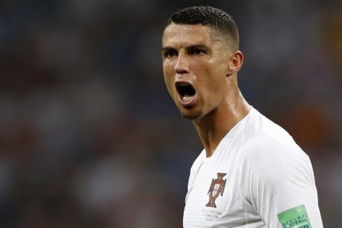 Portugal's Cristiano Ronaldo reacts angry during the round of 16 match between Uruguay and Portugal at the 2018 soccer World Cup at the Fisht Stadium in Sochi, Russia, Saturday, June 30, 2018. (AP Photo/Francisco Seco)