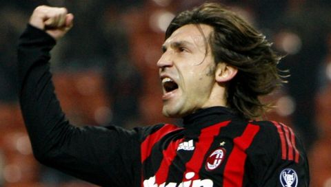 AC Milan midfielder Andrea Pirlo celebrates after scoring during the UEFA Cup, Round of 32, second-leg soccer match between AC Milan and Bremen, at the San Siro stadium, in Milan, Italy, Thursday, Feb. 26, 2009. (AP Photo/Antonio Calanni)