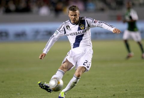 CARSON, CA - APRIL 14:  David Beckham #23 of the Los Angeles Galaxy shoots a nd scores a goal in the second half against the Portland Timbers at The Home Depot Center on April 14, 2012 in Carson, California.  The Galaxy won 3-1.  (Photo by Stephen Dunn/Getty Images)