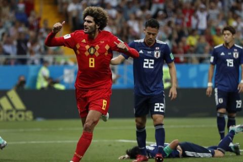 Belgium's Marouane Fellaini celebrates after scoring his side's second goal during the round of 16 match between Belgium and Japan at the 2018 soccer World Cup in the Rostov Arena, in Rostov-on-Don, Russia, Monday, July 2, 2018. (AP Photo/Natacha Pisarenko)