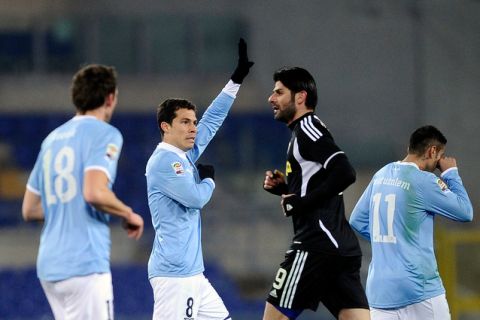 SS Lazio midfielder Hernanes (2ndL) celebrates after scoring against Cesena during their Serie A football match in Rome's Olympic Stadium on Febuary 9, 2012.  AFP PHOTO / Filippo MONTEFORTE (Photo credit should read FILIPPO MONTEFORTE/AFP/Getty Images)