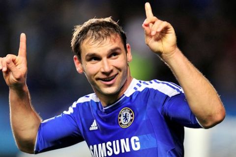 Chelsea's Serbian defender Branislav Ivanovic celebrates scoring his team's fourth goal during the UEFA Champions League, Group E, football match between Chelsea and KRC Genk at Stamford Bridge in London on October 19, 2011.  AFP PHOTO / GLYN KIRK (Photo credit should read GLYN KIRK/AFP/Getty Images)
