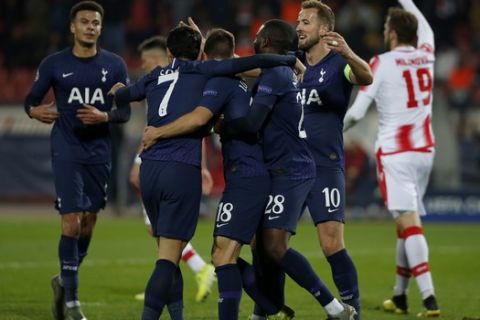 Tottenham Hotspur players celebrate after scoring a goal against Red Star Belgrade during their Champions League group B soccer match at the Rajko Mitic stadium in Belgrade, Serbia, Wednesday, Nov. 6, 2019. (AP Photo/Marko Drobnjakovic)