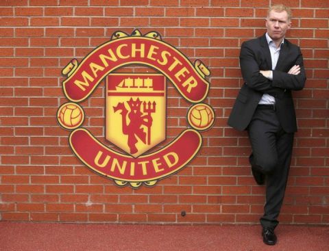 Former Manchester United player Paul Scholes stands next to a team emblem before their English Premier League soccer match against Everton at Old Trafford in Manchester, northern England October 5, 2014. REUTERS/Phil Noble (BRITAIN - Tags: SPORT SOCCER) NO USE WITH UNAUTHORIZED AUDIO, VIDEO, DATA, FIXTURE LISTS, CLUB/LEAGUE LOGOS OR "LIVE" SERVICES. ONLINE IN-MATCH USE LIMITED TO 45 IMAGES, NO VIDEO EMULATION. NO USE IN BETTING, GAMES OR SINGLE CLUB/LEAGUE/PLAYER PUBLICATIONS. FOR EDITORIAL USE ONLY. NOT FOR SALE FOR MARKETING OR ADVERTISING CAMPAIGNS 
Picture Supplied by Action Images